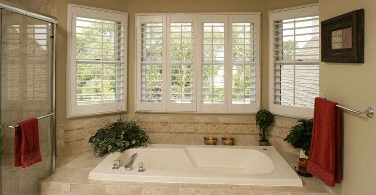 Plantation shutters in New Brunswick bathroom.